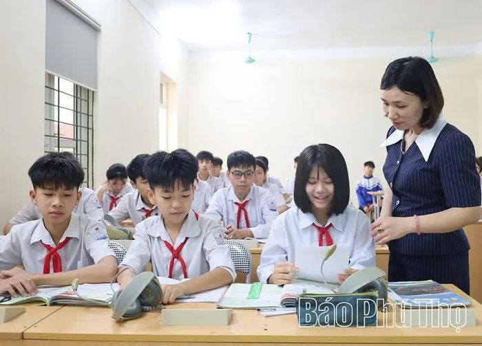 Cô và trò Trường THCS Nguyễn Quang Bích thi đua dạy tốt, học tốt.