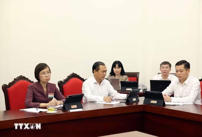  Các đại biểu thảo luận tại tổ. Ảnh: Thống Nhất/TTXVN. 