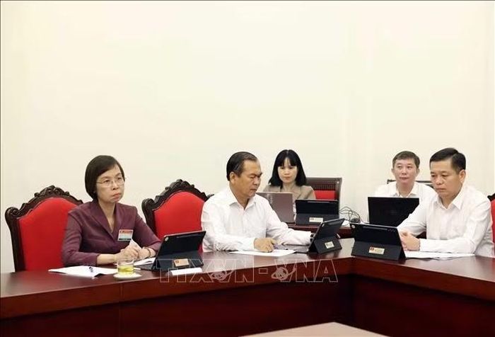 Các đại biểu thảo luận tại tổ. Ảnh: Thống Nhất/TTXVN
