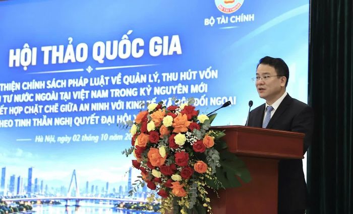 Thứ trưởng Bộ Tài chính Trần Quốc Phương phát biểu khai mạc Hội thảo. Ảnh: Bích Thủy