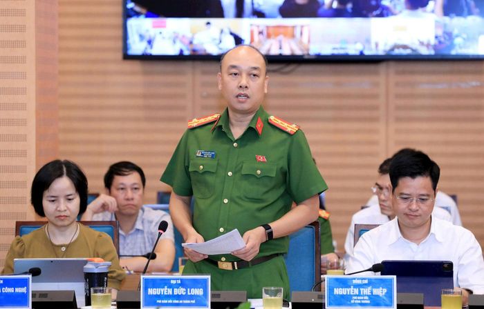 Đại tá Nguyễn Đức Long, Phó Giám đốc Công an thành phố Hà Nội trả lời tại họp báo. Ảnh: Đình Hiệp