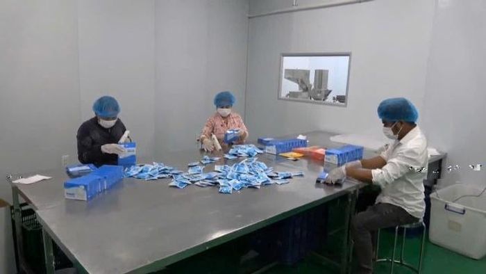 Hiện trường và tang vật thu giữ trong vụ án triệt phá đường dây sản xuất thực phẩm chức năng giảm cân có chứa chất cấm. Ảnh: Cổng Thông tin điện tử Bộ Công an