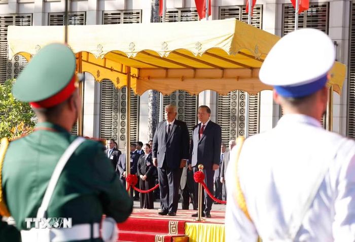Lễ đón chính thức Tổng thống Cộng hòa Panama José Raúl Mulino và Phu nhân. (Ảnh: Thống Nhất/TTXVN)