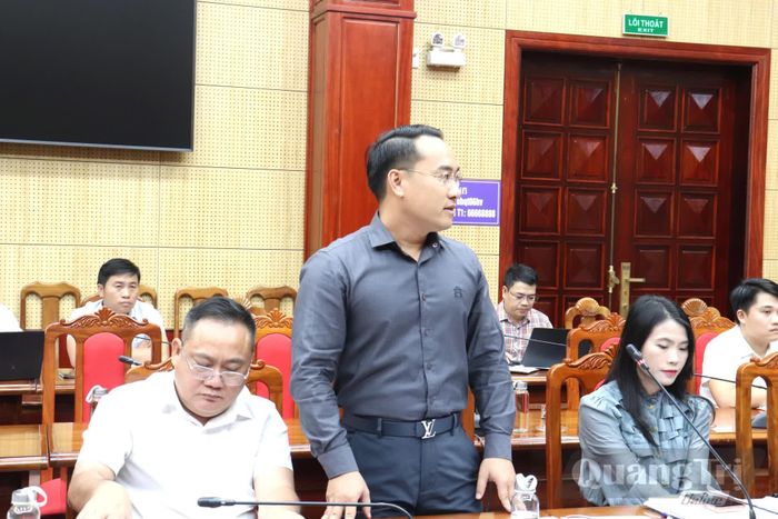 Đại diện doanh nghiệp đóng góp ý kiến - Ảnh: L.T