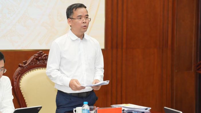 Ông Nguyễn Xuân Bắc, Phó Vụ trưởng phụ trách Vụ Tín dụng (Ngân hàng Nhà nước) phát biểu tại cuộc họp báo. (Ảnh: Việt Phong)