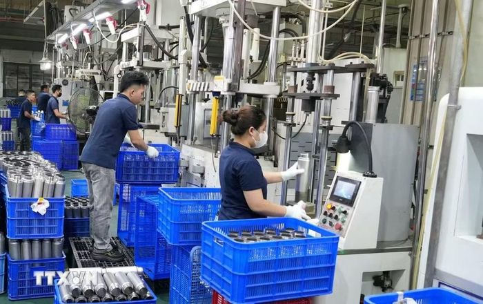 Dây chuyền sản xuất ứng dụng robot tự động tại Khu công nghiệp Yên Phong II-C, Bắc Ninh. (Ảnh: Đồng Thúy/TTXVN)
