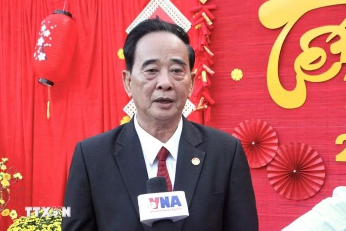 Ông Sim Chy, Chủ tịch Hội Khmer-Việt Nam tại Campuchia chia sẻ cộng đồng bà con người gốc Việt ở Campuchia luôn một lòng hướng về Tổ quốc. (Ảnh: Quang Anh/TTXVN)