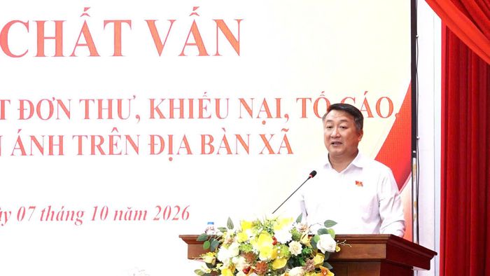 Bí thư Đảng ủy, Chủ tịch HĐND xã Bình Minh Nguyễn Khánh Bình phát biểu tại hội nghị. Ảnh: PV
