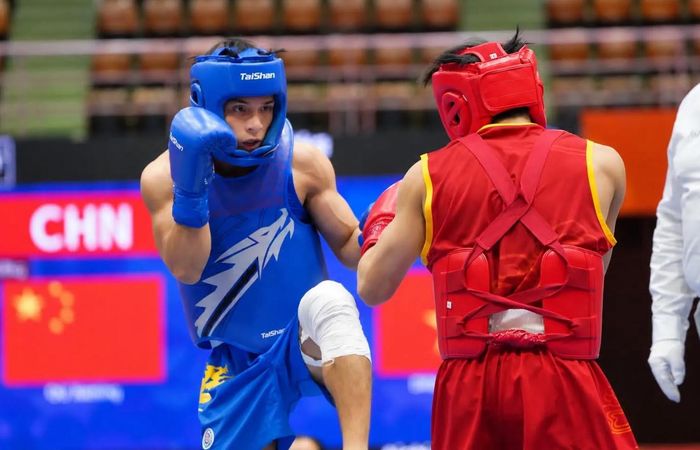 Võ sĩ Đinh Văn Tâm thi đấu ở ASIAD 20. Ảnh: Bùi Lượng.
