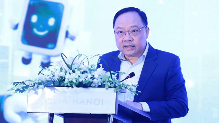 Ông Phạm Anh Tuấn, Vụ trưởng Vụ Thanh toán (Ngân hàng Nhà nước) phát biểu tại buổi họp báo. (Ảnh: Việt Phong)