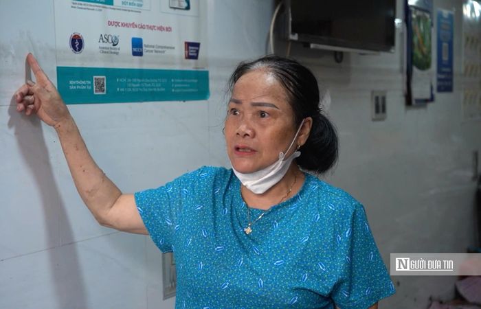 Bà Lương Thị Hường kể lại thời điểm nước dâng cao khiến gia đình không kịp trở tay.