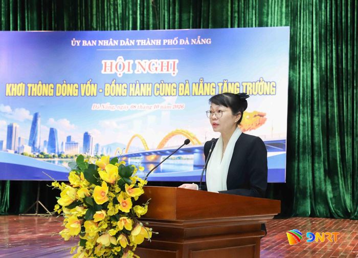 Giám đốc Sở Tài chính Trần Thị Thanh Tâm báo cáo tại hội nghị. Ảnh: NGỌC PHÚ