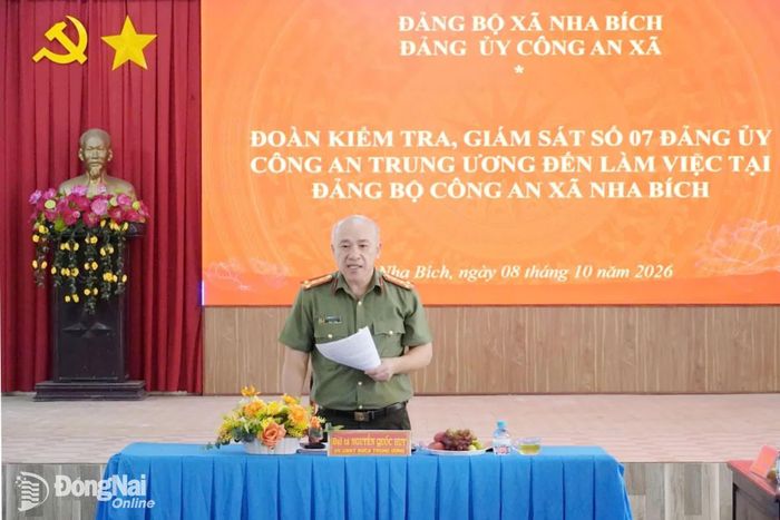 Đại tá Nguyễn Quốc Huy, Ủy viên Ủy ban Kiểm tra Đảng ủy Công an Trung ương phát biểu tại buổi làm việc. Ảnh: Bá Lợi