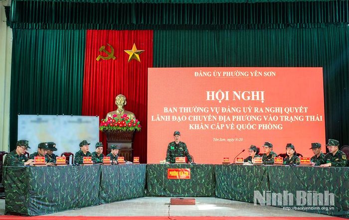Hội nghị Ban Thường vụ Đảng ủy ra Nghị quyết lãnh đạo chuyển địa phương vào trạng thái khẩn cấp về quốc phòng tại cuộc diễn tập. Ảnh: Ngọc Linh