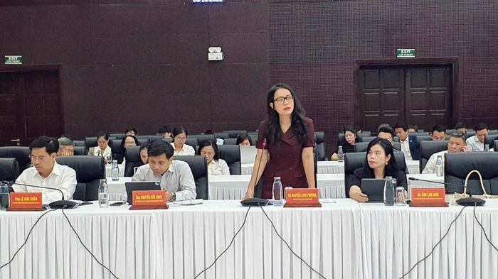 Bà Nguyễn Linh Phương, Phó Vụ trưởng Vụ Chính sách tiền tệ thuộc NHNN phát biểu, giải đáp những vấn đề liên quan các chính sách, chương trình cho vay mà doanh nghiệp quan tâm - Ảnh C. Thái