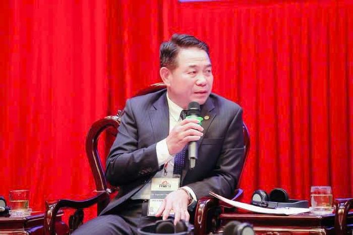 TS. Nguyễn Tiến Thành, Bí thư Đảng ủy, Chủ tịch HĐND phường Xuân Đỉnh phát biểu tại tọa đàm bàn tròn. Ảnh: PV