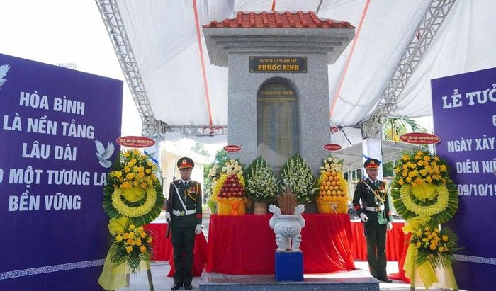 Bia tưởng niệm các nạn nhân Vụ thảm sát Diên Niên – Phước Bình tại thôn Phước Lộc (thôn Phước Bình cũ), xã Sơn Tịnh