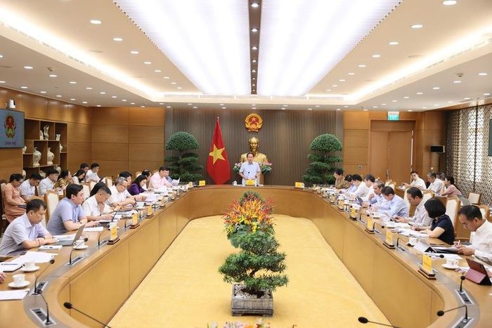 Cuộc họp về tình hình triển khai tổng rà soát hệ thống văn bản quy phạm pháp luật - Ảnh: chinhphu.vn/Thu Sa