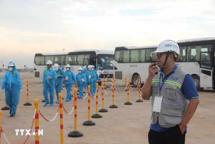 Diễn tập tình huống giả định sân bay Long Thành tiếp nhận và phục vụ tàu bay chở hành khách đến từ vùng có dịch. (Ảnh: Công Phong/TTXVN)