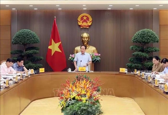 Phó Thủ tướng Lê Tiến Châu chủ trì họp về tiến độ tổng rà soát hệ thống văn bản quy phạm pháp luật. Ảnh: An Đăng/TTXVN