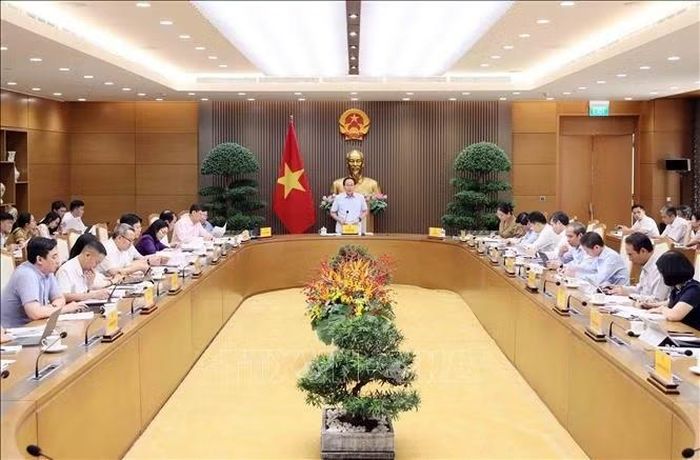 Phó Thủ tướng Lê Tiến Châu chủ trì họp về tiến độ tổng rà soát hệ thống văn bản quy phạm pháp luật. Ảnh: An Đăng/TTXVN