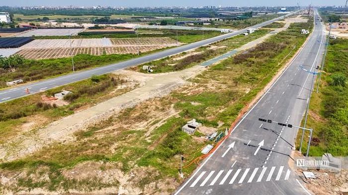 Đường song hành thuộc dự án Vành đai 4 - Vùng Thủ đô Hà Nội đoạn qua địa bàn xã Ô Diên (Ảnh: Hữu Thắng).