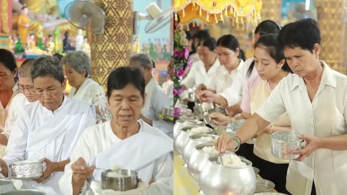 Người dân thực hiện nghi thức xới cơm. Ảnh: Trí Trần.