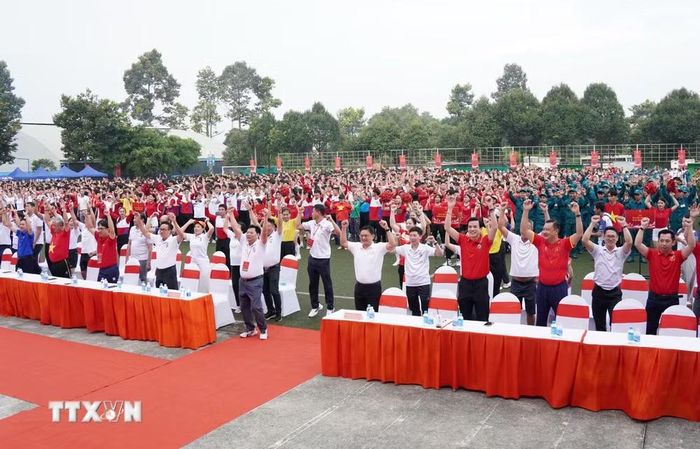 Các đại biểu, vận động viên và người tham gia đồng diễn vận động tập thể tại Lễ phát động phong trào toàn dân tập luyện thể thao ở Thành phố Hồ Chí Minh. (Ảnh: Trung Tuyến/TTXVN)