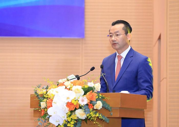 Phó Giám đốc Sở Văn hóa, Thể thao và Du lịch Hà Nội Phạm Xuân Tài báo cáo thành tích của Đoàn Thể thao Hà Nội tại ASIAD 20. Ảnh: Viết Thành