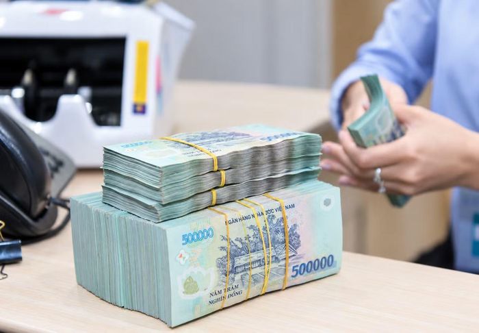 Lãi suất liên ngân hàng giảm chưa phản ánh hết lãi suất cho vay của người dân và doanh nghiệp hiện tại. Ảnh: NY.
