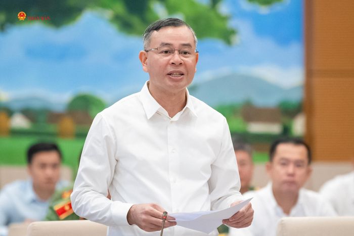 Bộ trưởng Bộ Tài chính Ngô Văn Tuấn trình bày Tờ trình dự án Luật. Ảnh: Phạm Thắng