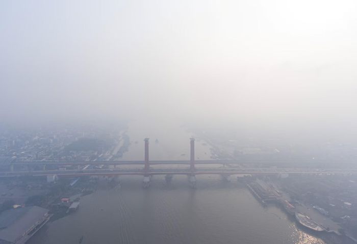 Tiêu chuẩn đo lường ô nhiễm không khí khác nhau giữa các quốc gia. Ảnh: Reuters.
