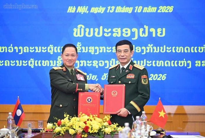 Phó Thủ tướng, Bộ trưởng Bộ Quốc phòng 2 nước ký Kế hoạch hợp tác quốc phòng Việt Nam-Lào năm 2027 - Ảnh: chinhphu.vn/Diệu Anh