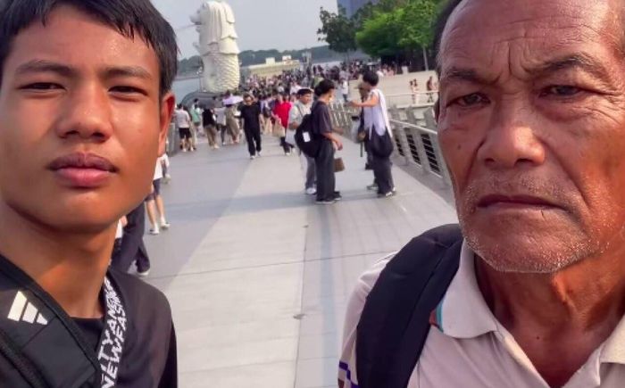 Queue cùng ông nội đi từ Thái Lan đến Singapore. Ảnh: IG