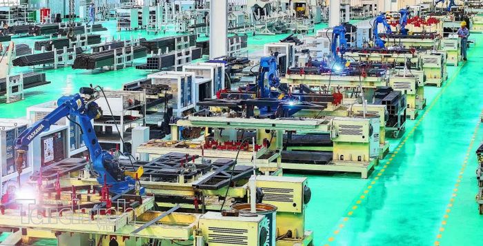 Doanh nghiệp Việt ứng dụng công nghệ trong sản xuất, kinh doanh. Ảnh: Lê Toàn.