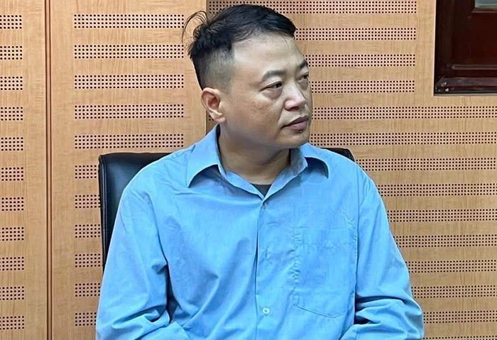 Nguyễn Hòa Bình tại cơ quan Công an. Ảnh: CQCA