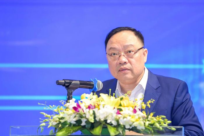 Ông Phạm Anh Tuấn - Vụ trưởng Vụ Thanh toán Ngân hàng Nhà nước phát biểu tại hội thảo. (Ảnh: Vietnam+)