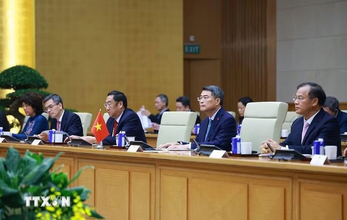 Thủ tướng Lê Minh Hưng hội kiến đồng chí Vilay Lakhamfong, Thường trực Ban Bí thư Trung ương Đảng Nhân dân Cách mạng Lào. (Ảnh: Dương Giang/TTXVN)