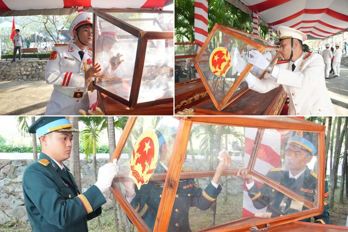 Các lực lượng lau kỹ càng các lồng kính trước khi buổi lễ bắt đầu. Ảnh: Thạc Hiếu