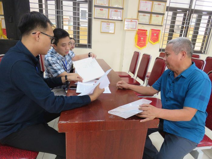 Việc chi trả diễn ra thuận lợi. Ảnh: PV