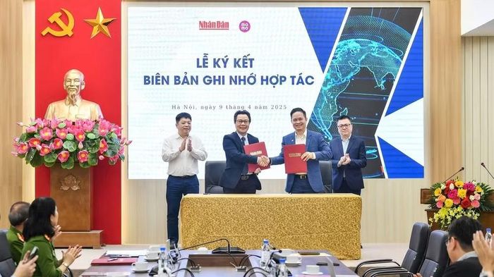 Báo Nhân Dân ký kết hợp tác với Cục Cảnh sát Quản lý hành chính về trật tự xã hội (C06) - Bộ Công an đưa các tin, bài, chuyên mục của Báo Nhân Dân lên ứng dụng VNeID. (Ảnh: Báo Nhân Dân)