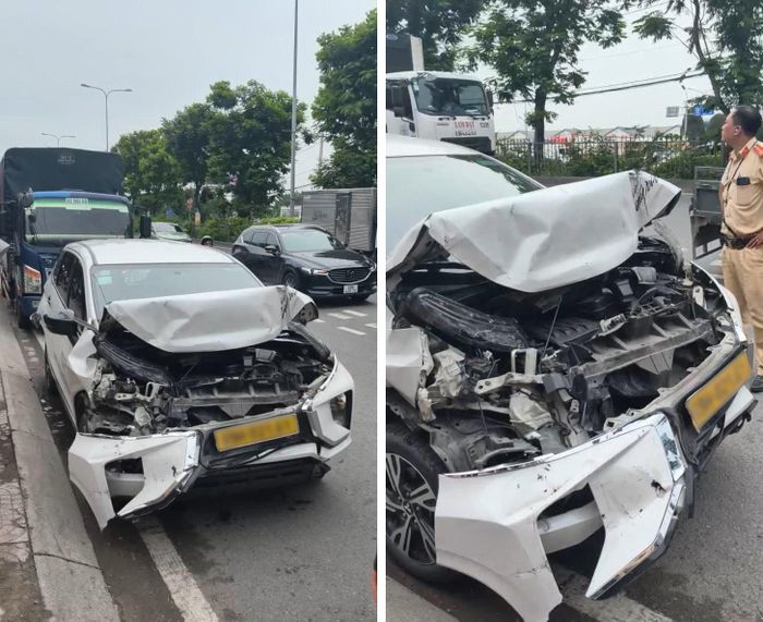  Chiếc xe ô tô bị tông hư hỏng ở phần đầu. Ảnh: KIẾN VĂN 