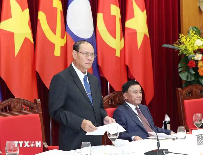 Đồng chí Vilay Lakhamphong, Ủy viên Bộ Chính trị, Thường trực Ban Bí thư Trung ương Đảng Nhân dân Cách mạng Lào phát biểu tại Tiệc chiêu đãi. (Ảnh: Phương Hoa/TTXVN)