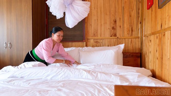 Gia đình bà Hà Thị Cứu đầu tư gần 1 tỷ đồng xây dựng phòng nghỉ, nhà sàn ẩm thực để phục vụ du khách tốt hơn.