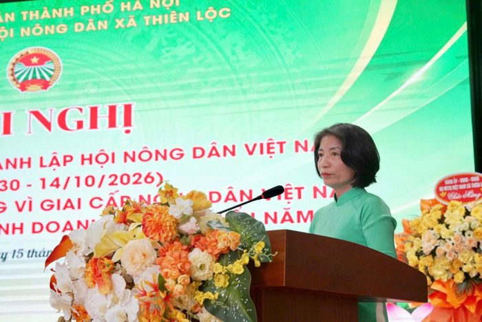 Chủ tịch Hội Nông dân xã Nguyễn Thị Lâm trình bày diễn văn kỷ niệm. Ảnh: PV