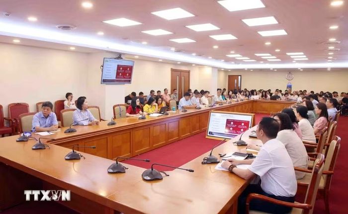  Đảng viên thuộc Đảng bộ Thông tấn xã Việt Nam tham dự Hội nghị trực tuyến tại điểm cầu trụ sở Thông tấn Quốc gia (5 Lý Thường Kiệt, Hà Nội). Ảnh: Phạm Kiên/TTXVN. 