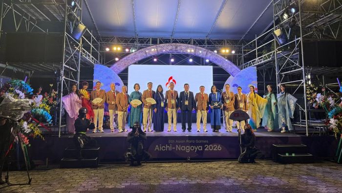 Đoàn Thể thao người khuyết tật Việt Nam tham dự Asian Para Games 5 tại Lễ Thượng cờ. (Ảnh: HOÀI THU)