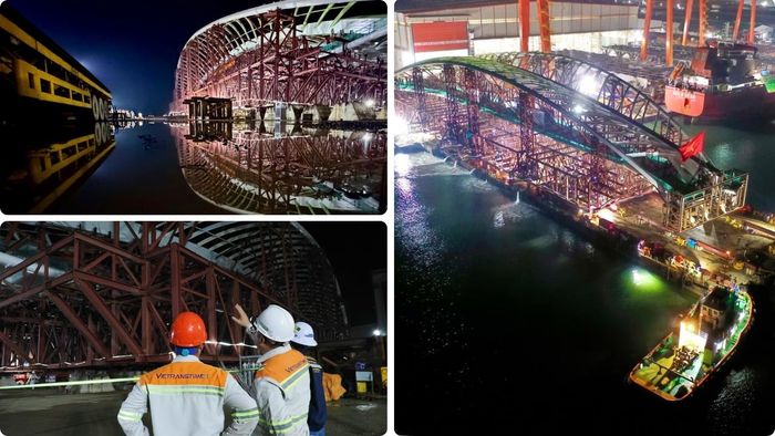  Công tác đưa kết cấu cầu lên sà lan được theo dõi, kiểm soát chặt chẽ. Ảnh: HOÀNG HÙNG 