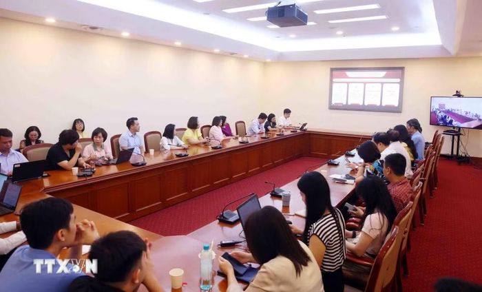 Đảng viên thuộc Đảng bộ Thông tấn xã Việt Nam tham dự Hội nghị trực tuyến tại điểm cầu trụ sở Thông tấn Quốc gia (5 Lý Thường Kiệt, Hà Nội). (Ảnh: Phạm Kiên/TTXVN)