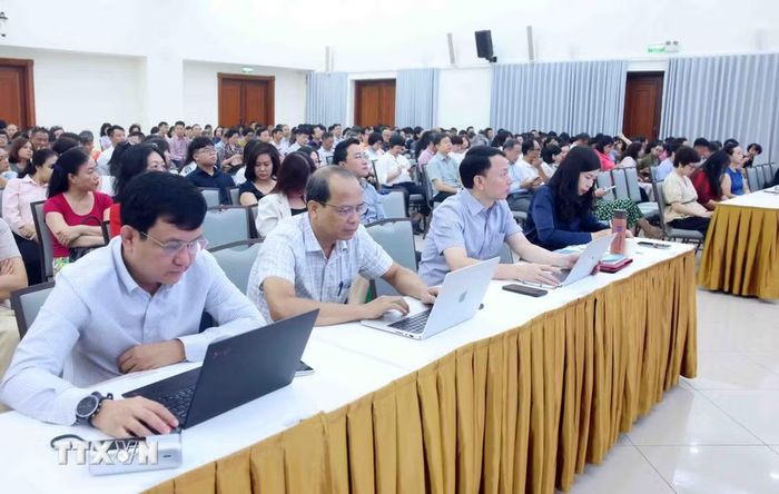 Đảng viên thuộc Đảng bộ Thông tấn xã Việt Nam tham dự Hội nghị trực tuyến tại điểm cầu trụ sở Thông tấn Quốc gia (5 Lý Thường Kiệt, Hà Nội). (Ảnh: Phạm Kiên/TTXVN)